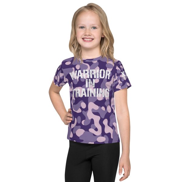 A girl wearing a 'Warrior in Training' Kids Crew Neck T-Shirt (Purple Camo).