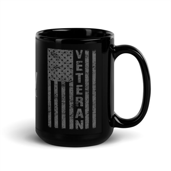 A black Distressed Flag Veteran Mug featuring the word "veteran" and a distressed flag design.