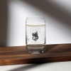 A XXV Tactical Collectable Liberty Lager Can-Shaped Glass sitting on a wooden table.