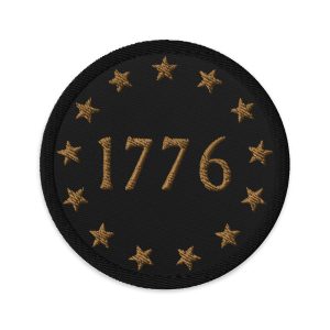 A black Gold 1776 Flag Patch with gold stars and the number 1776, resembling a flag.