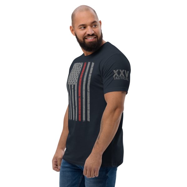 A man proudly wearing a Thin Red Line Flag t-shirt.