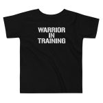 A 'Warrior in Training' toddler short sleeve tee in black, proudly displaying the words "warrior in training".
