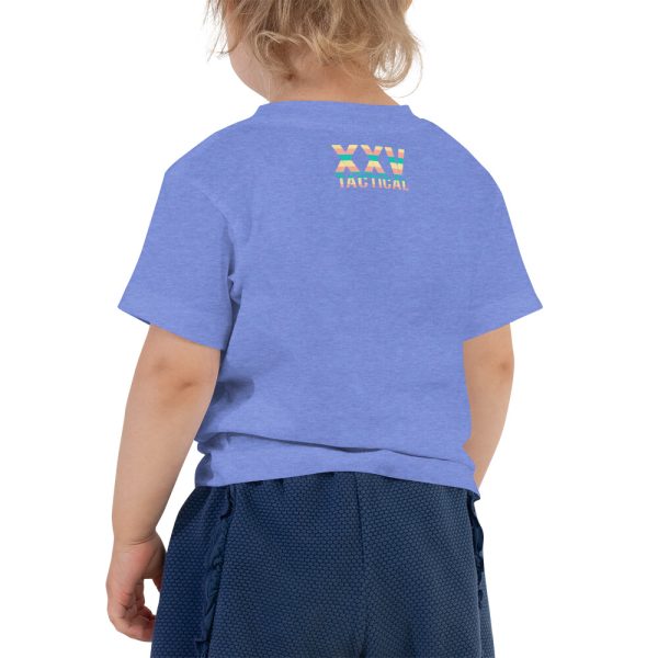 A toddler, full of dreams and hopes, wearing a 'Dream Believe Achieve' Unicorn T-shirt and shorts.