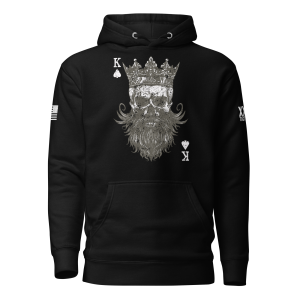 The Men’s King of Spades Hoodie is a black hoodie showcasing an intricate illustration of the King of Spades with a beard and crown on the front, alongside playing card symbols and text adorning the sleeves.