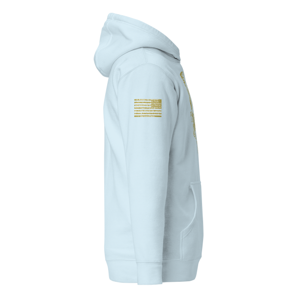 A light blue Women's Saint Michael defeating Satan Hoodie, inspired by Saint Michael, with an American flag.