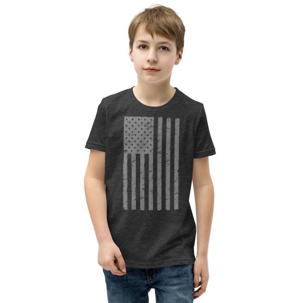 A youth proudly donning a Youth American Flag T-Shirt.
